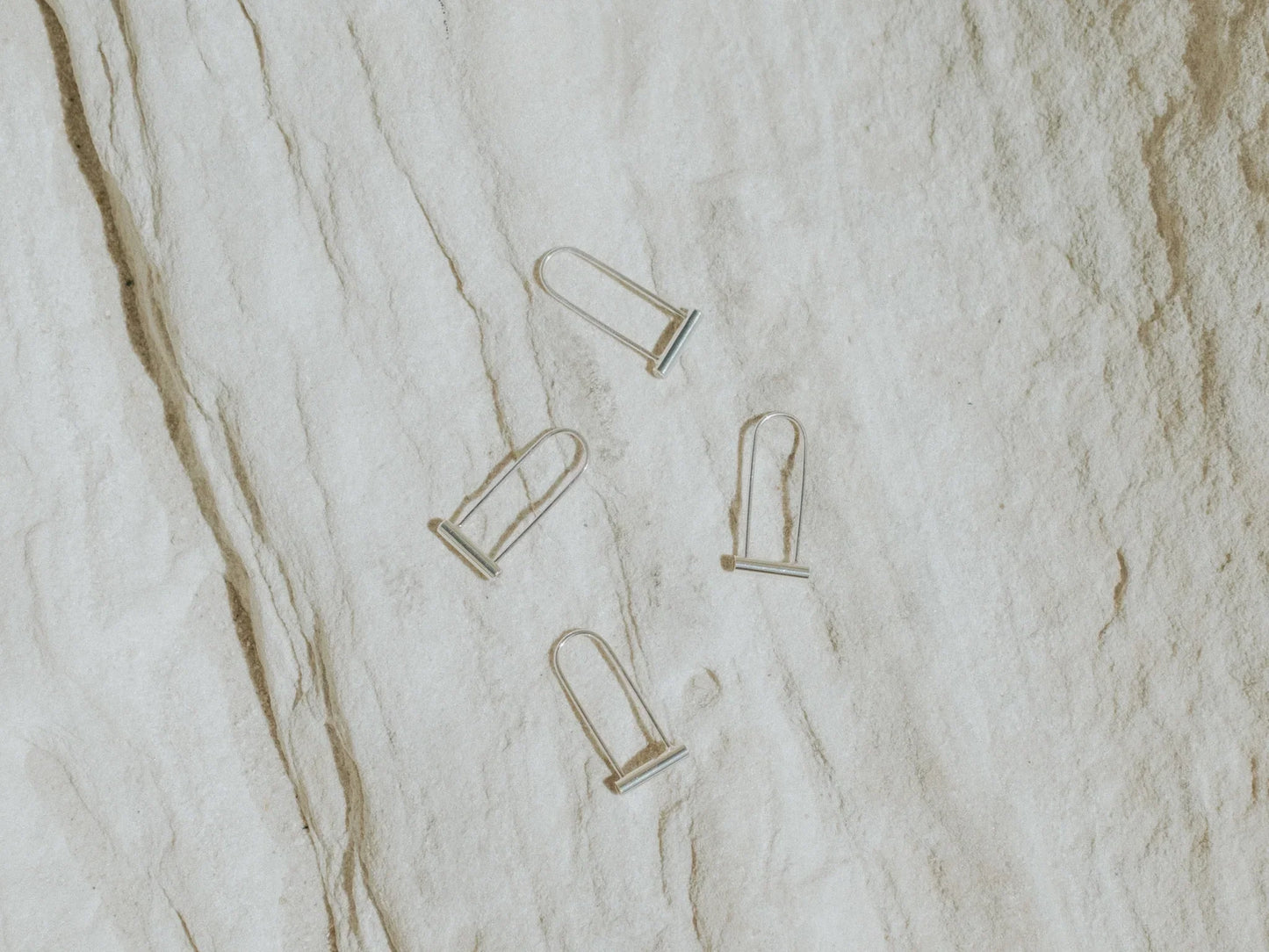 Cindre Elongated Baby Bike Lock Earrings